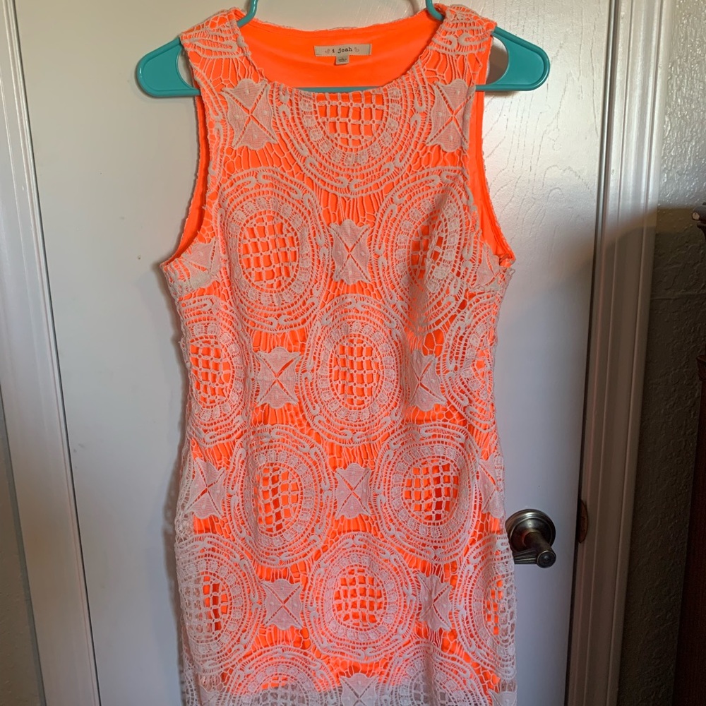 Orange and lace dress.